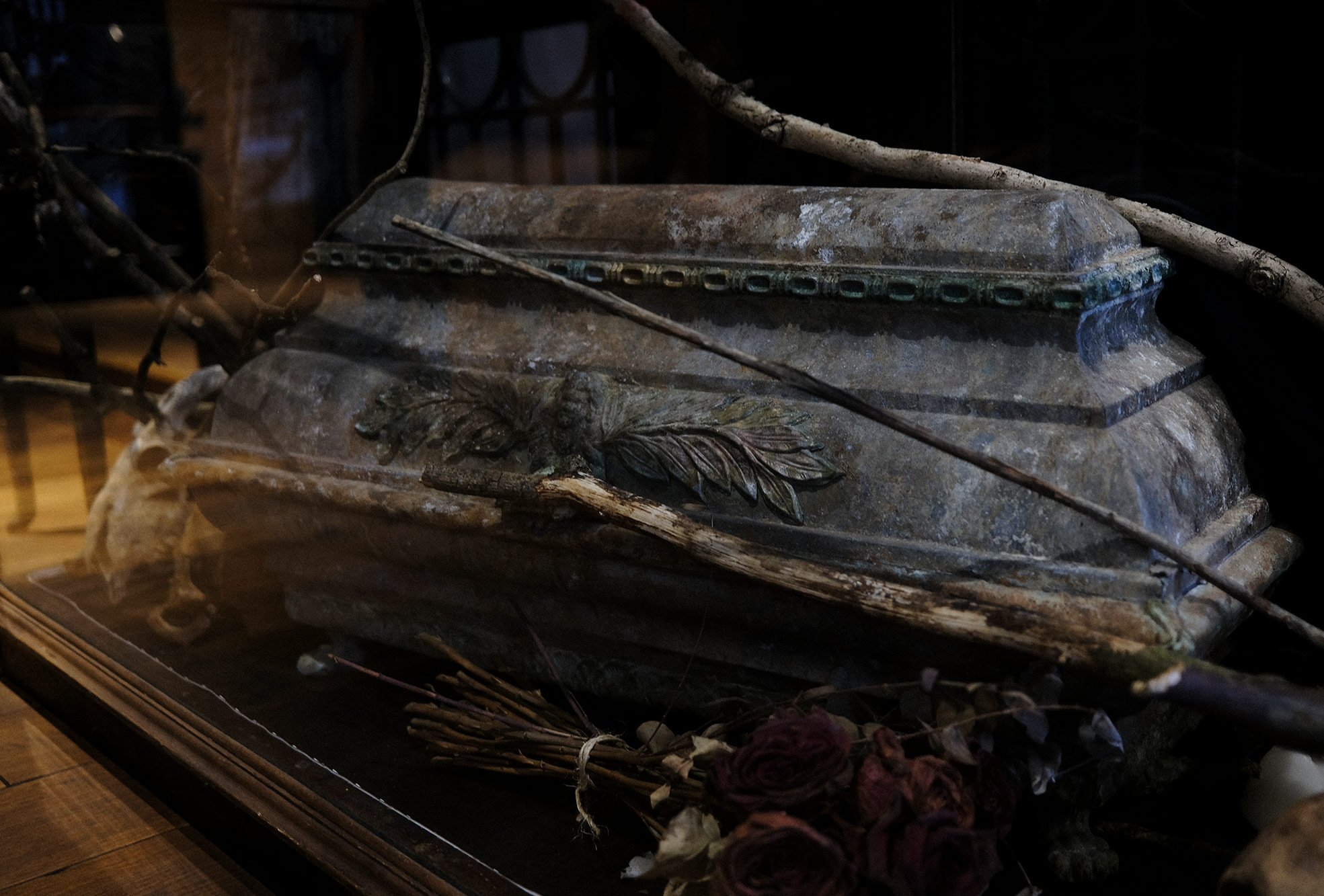 an image of a childs coffin made from lead pewter