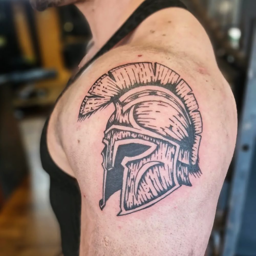 luke-tattoo-etching-spartan-helmet
