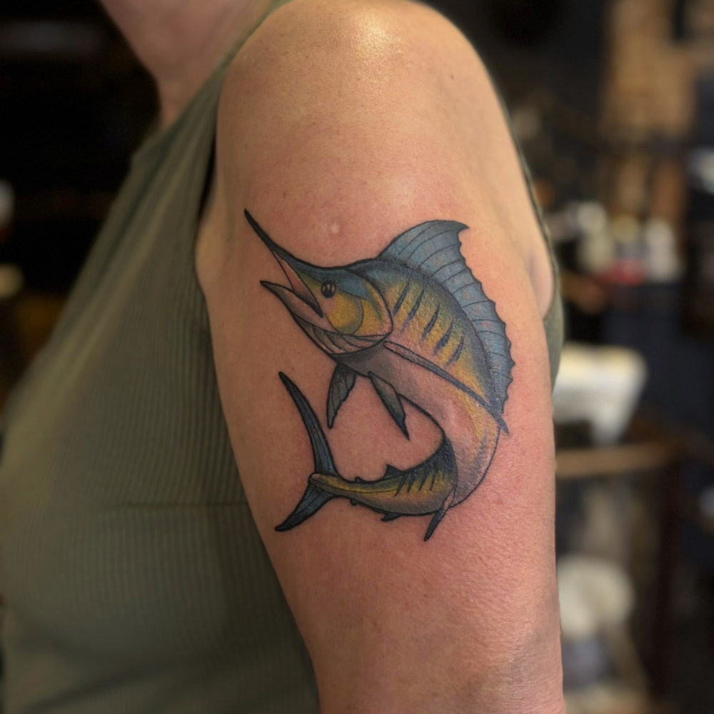Liv-Valentine-Marlin-Tattoo Photo of an arm tattoo featuring a full colour neo trad style marlin