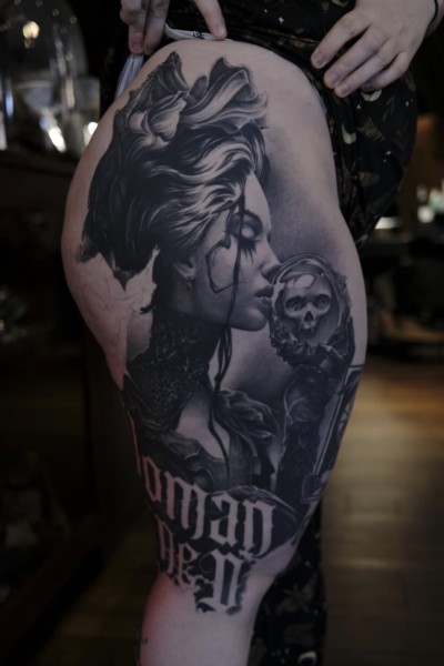 Leg piece by Mark Weatherhead of a victorian lady holding a glass sphere with skull inside