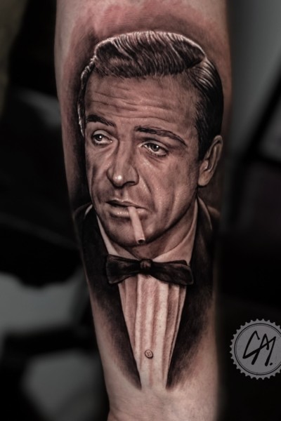 A tattoo of a portrait of sean connery as james bond
